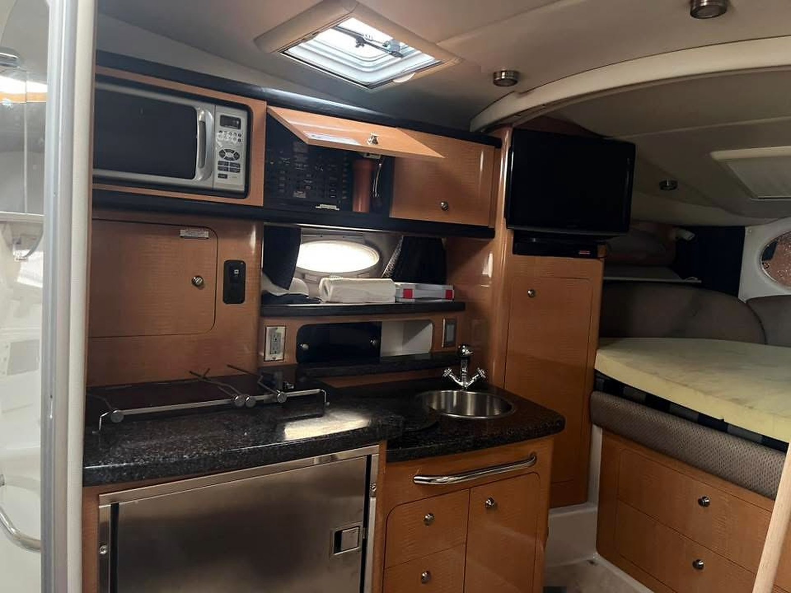 Chaparral 310 galley with microwave and sink